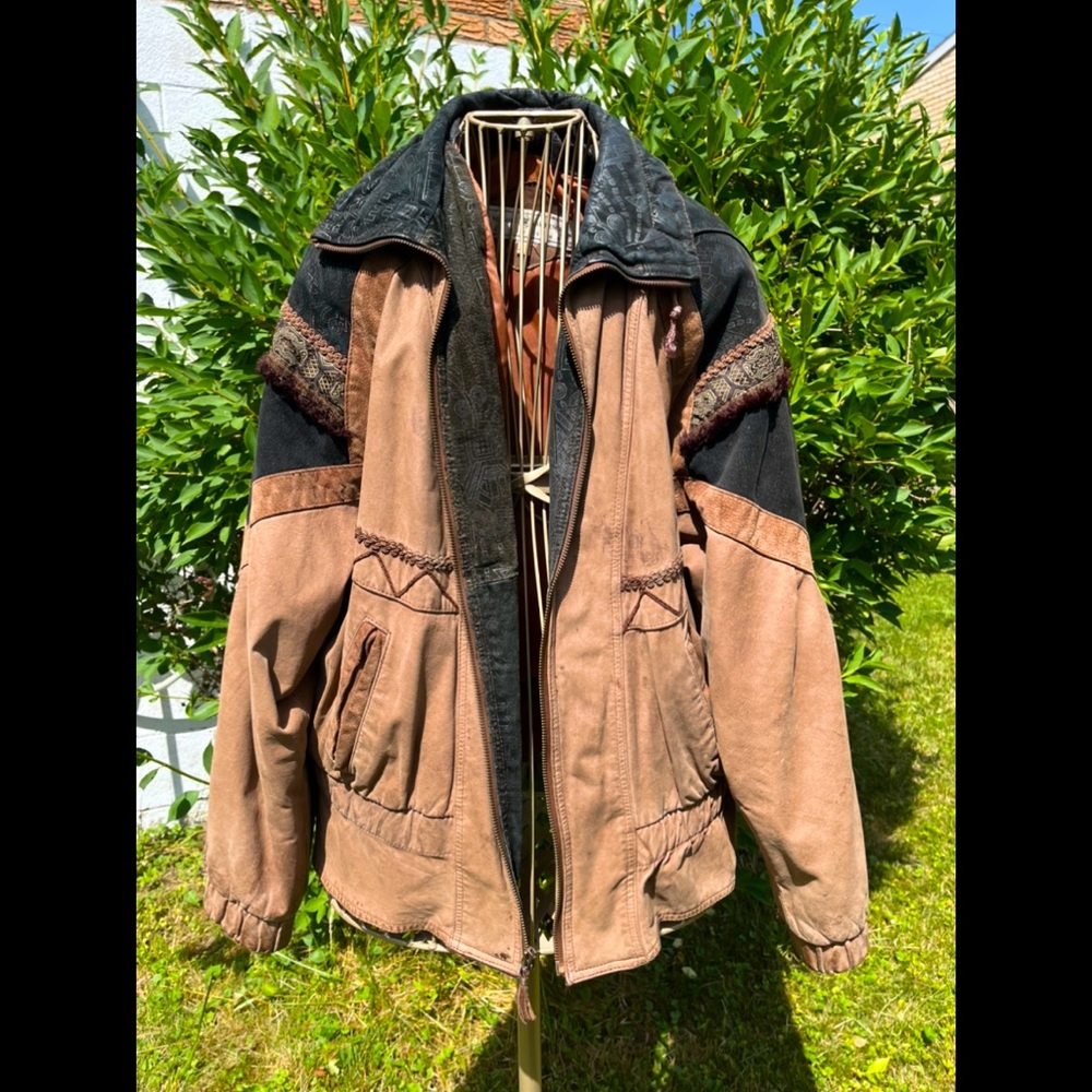 Vintage Genuine Leather Jacket with Hand Crafted patterns, details, and trims.